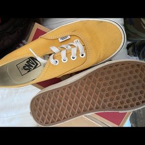 Yellow old skool vans